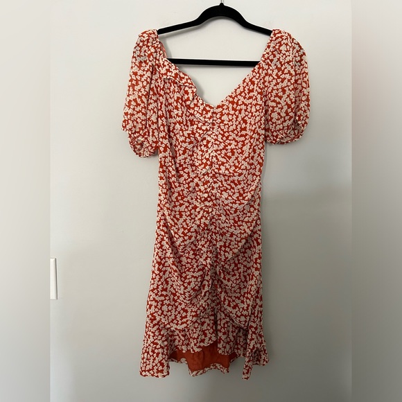 ASTR The Label Shirred Ruffle Mini Dress in Rust Ditsy Floral - Picture 2 of 7